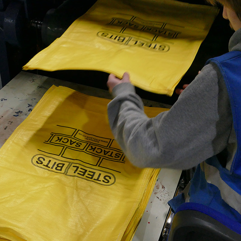 Workers packaging food-grade bags